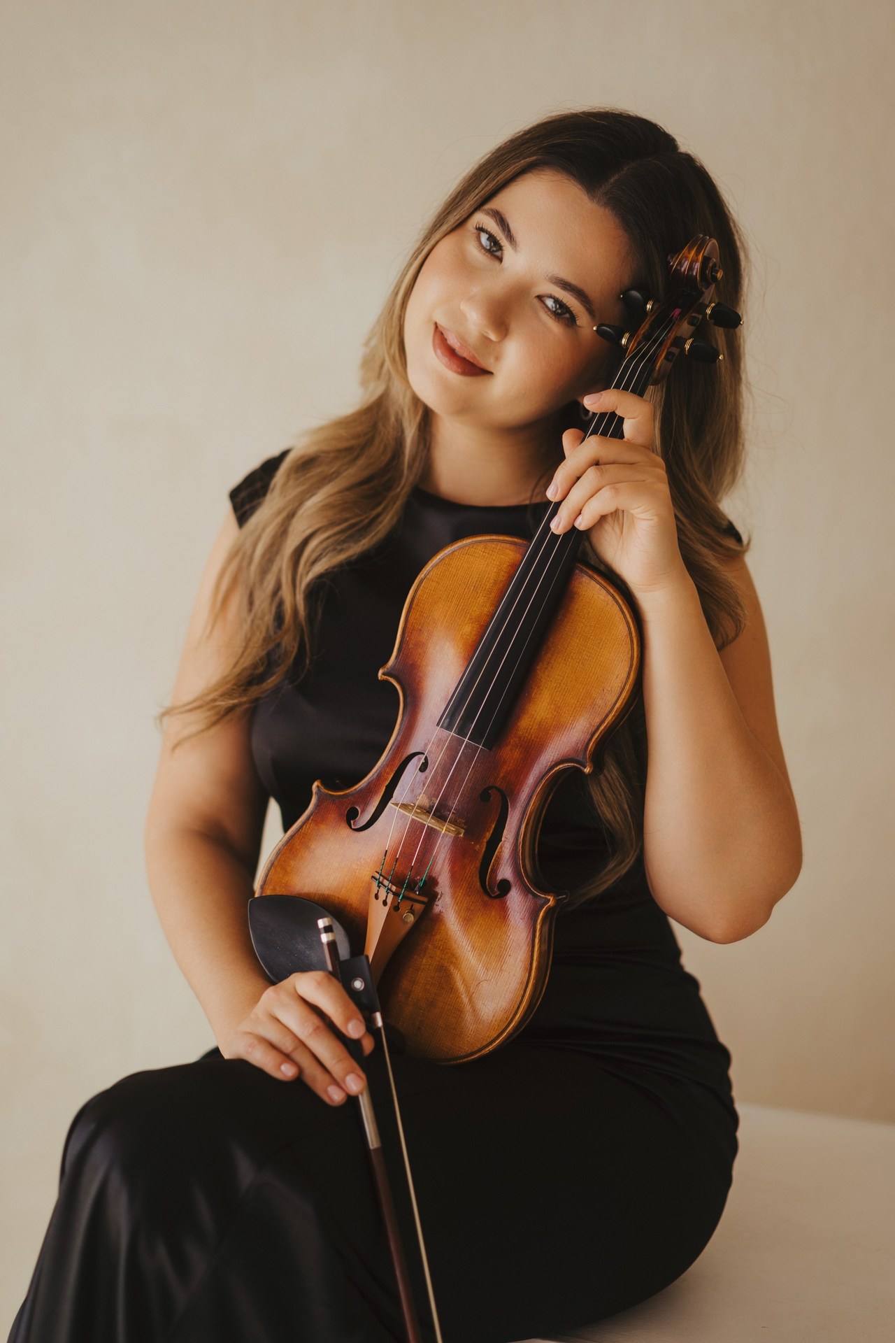 Maya Victoria studio portrait with violin
