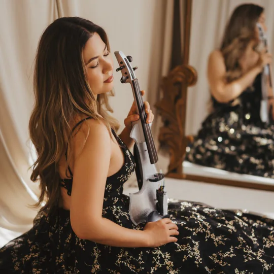 Maya Victoria with white electric violin