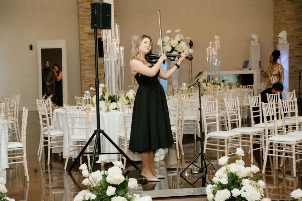 Maya Victoria performing at indoor wedding